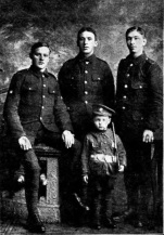 A photograph from the Aberdare Leader of 24 July 1915 of three boys of the 5th Welsh then stationed at Bedford but taken during their earlier posting at Burntisland, Fifeshire - they are Bugler Gwilym John Lloyd, left; Lance-Corporal Hamments, centre; Private E Goddard, right. The little chap was a regimental pet during their stay in Burntisland.